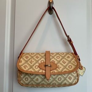 Original Dooney & Burke Leather Shoulder Bag,Cream/Tan in color, New condition!